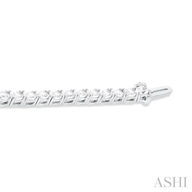 5 1/2 ctw East West Oval Cut Diamond Fashion Tennis bracelet in 14K White Gold