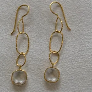 Delicate gold chain earrings with clear stone