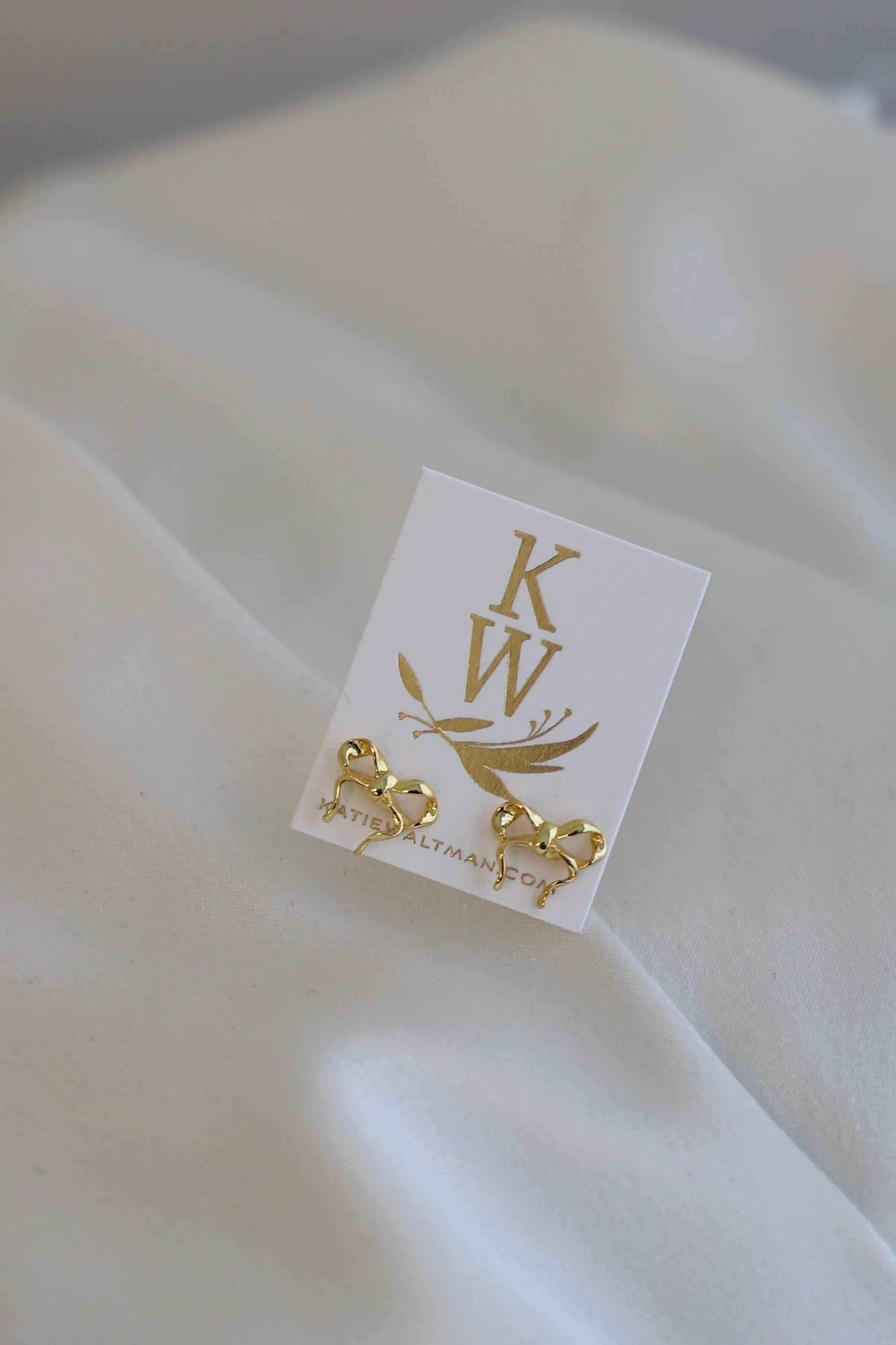 E1659G Gold Earrings-Golden Bow Studs