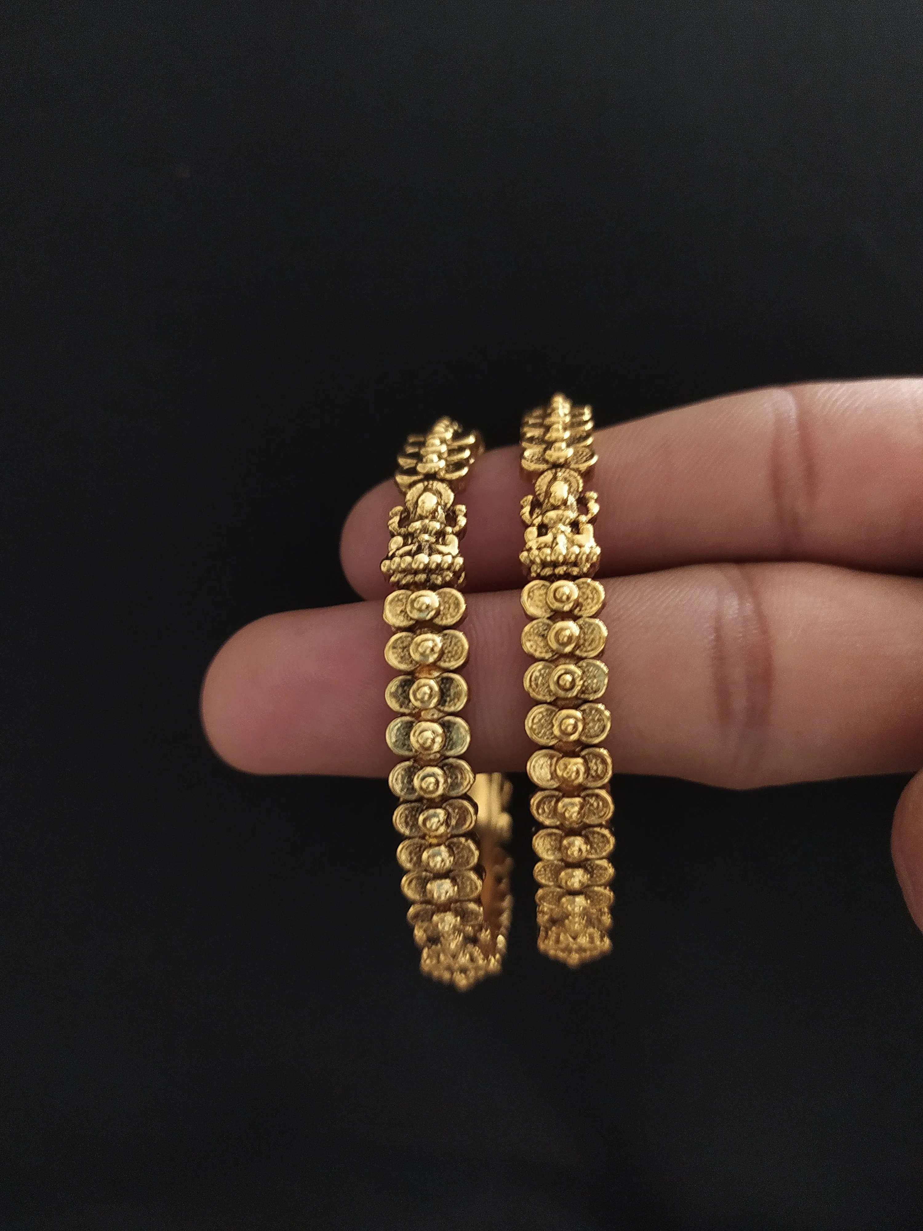 "Antique Plain Gold Lakshmi Bangles with Floral Design"